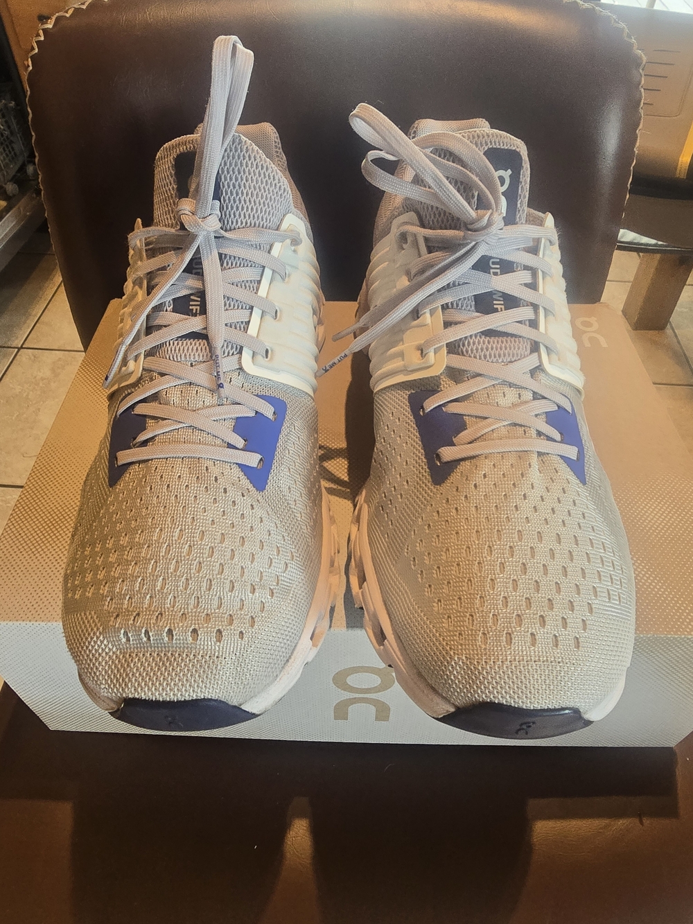 On Running Men’s Sneakers in Light Gray with Blue Accents